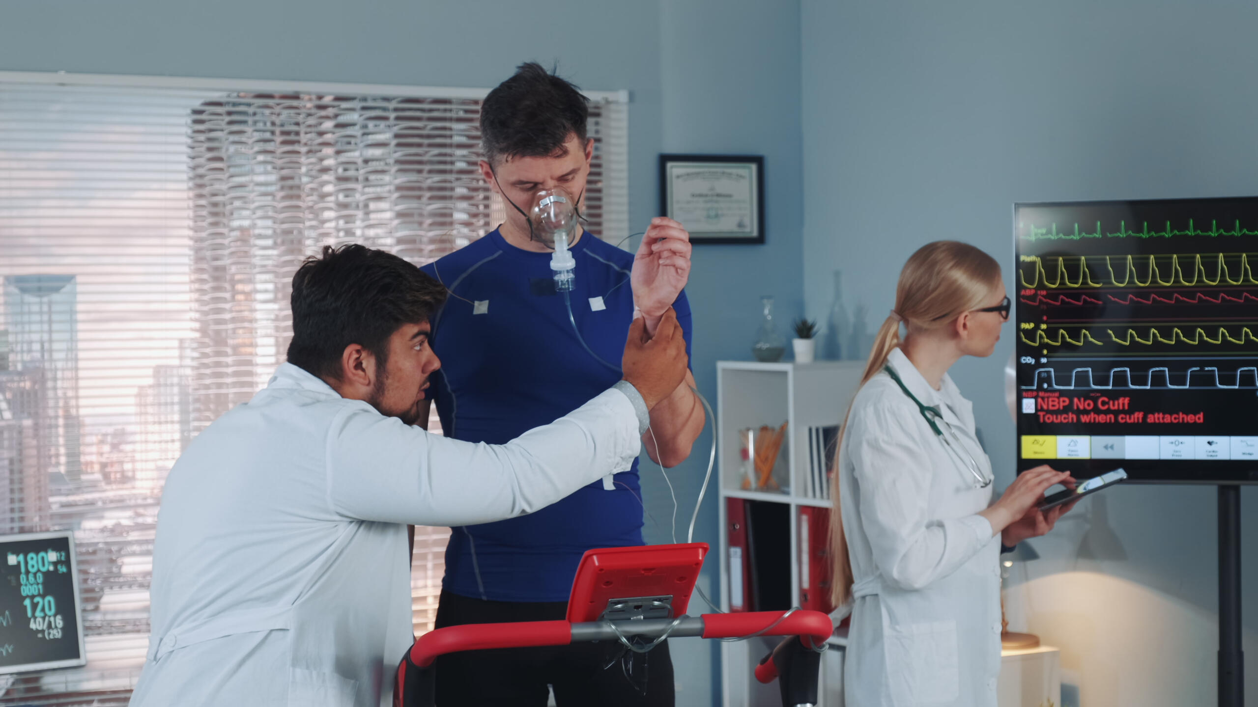Doctor preparing sportsman in oxygen mask for cardio respiratory test